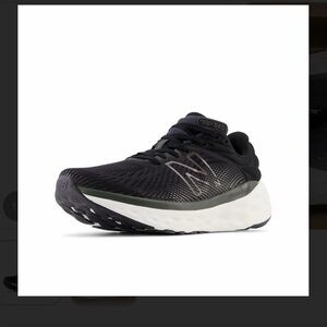 New Balance Black and White Athletic Shoes